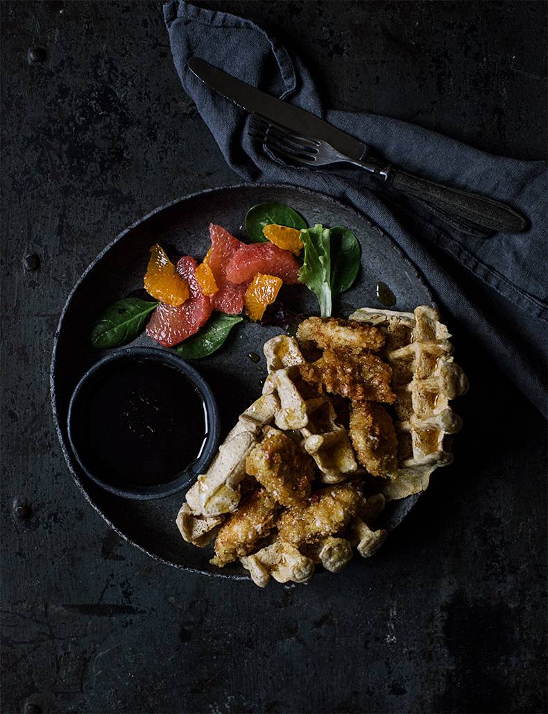 Waffles with chicken and maple syrup